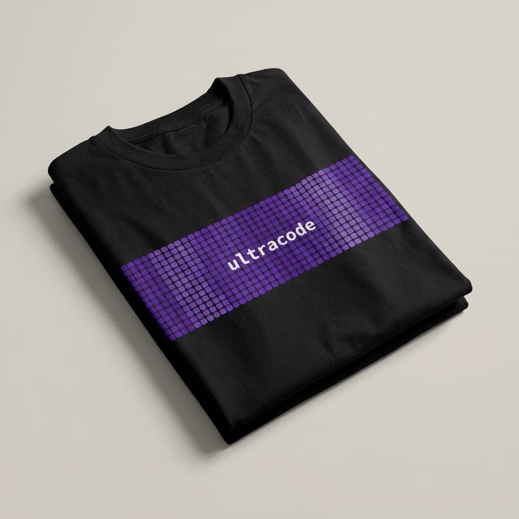 Folded view: Black t-shirt printed with a purple pixel-grid panel reading ultracode